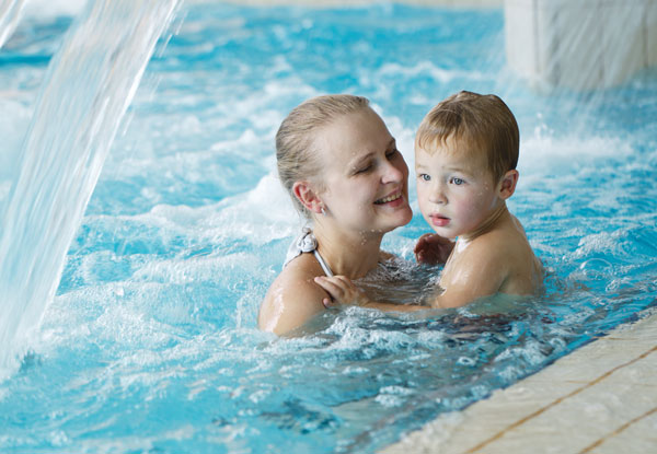 Child learning to swim